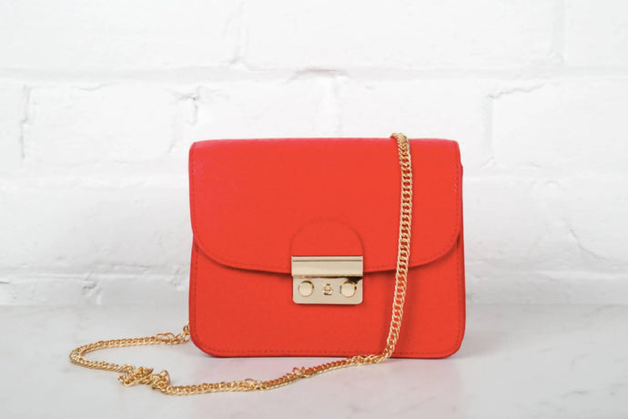 Bright Red Purse With Gold Detailing